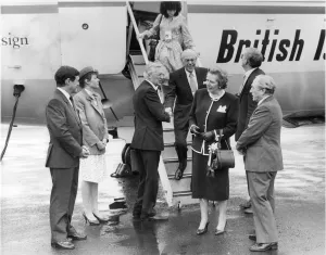 Margaret Thatcher and husband Dennis arrive at Newcastle Airport meeting Jim Denyer