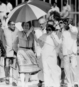 Margaret Thatcher and Indira Ghandi walking in India beneath umbrella - 19th April 1981