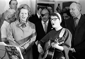Margaret Thatcher July 1980 visits Toynbee Hall in the East End singing with a nun