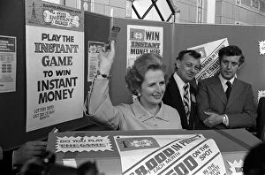 00147 Collection: Margaret Thatcher October 1977 holds up an instant game ticket Conservative Party