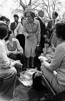 Margaret Thatcher in Pankhurst Gardens outside the Houses of Parliament standing under