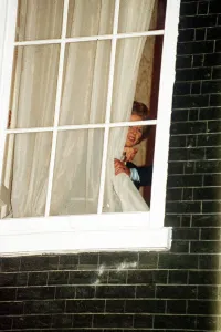 10 Downing Street Prints: Margaret Thatcher watches through the window at No 10 Downing Street 1990