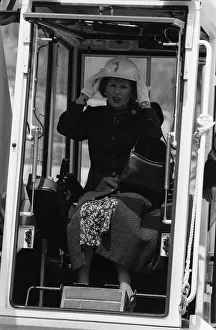 Margaret Thatcher wearing a hard hat at construction site in London for the new