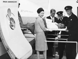 Margot Fonteyn Ballet Dancer with her paralysed husband as he was flown into Britain