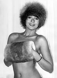 Marie Louise models a £55 red fox pillbox hat by Edward Mann