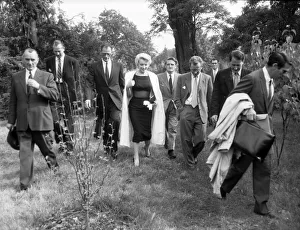 Marilyn Monroe and her husband, playwright Arthur Miller (3rd from the left)