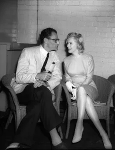 Core54 Prints: Marilyn Monroe with her new husband Arthur miller at a press conference at the Royal