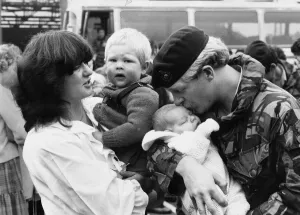 Marine Prints: Marine Andrew Riley delighted to see his baby son Darren 4 weeks old born while Andrew