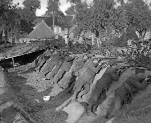 00117 Prints: Marines from the Naval brigade in a trench at Vieux Wien near Antwerp awaiting the German