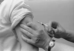 Vaccination Prints: Marion Pollock, 15, subjuects herself to an injection against German measles (rubella