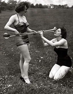 Drink Prints: Marjorie Leete aged 18 (black costume) of Sunderland kneeling down drinking a yard of ale