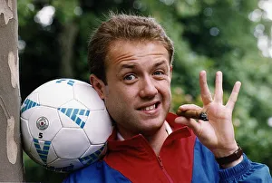 Mark Burdis Actor Holding football and cigar Dbase A©Mirrorpix