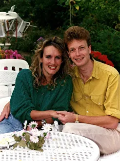 Mark Burgess Actor with wife Elizabeth sitting in a garden patio DBase