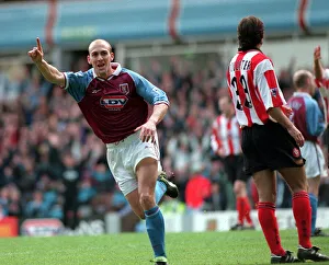 Mark Draper of Aston Villa celebrates scoring a goal against Southampton during