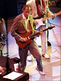 Mark Knopfler guitarist singer and musician at the Albert Hall performing on stage