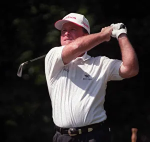 Tee Off Prints: Mark McCumber Golfer tees off during the second round in the 1996 British Open Golf