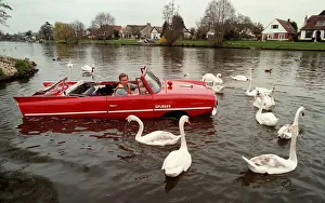 Mark Perkins from Ascot and his 1964 Amphicar March 1998 Feeding the swans