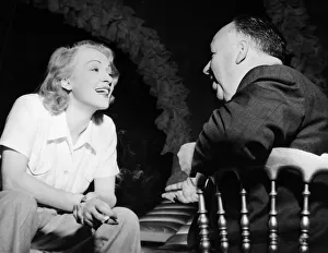 00194 Prints: Marlene Deitrich talks to Alfred Hitchcock film director 1949