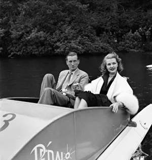 Boating Prints: Marquess of bath with mary castle in a pedalo boat on the lake at longleat park
