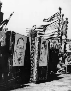 01462 Prints: Marshal Tito stands on the right as a Yugoslav commander addresses his troops during a