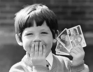 Mouth Prints: Martin Short from Stockton aged 4, with a pack of playing cards his mother recently