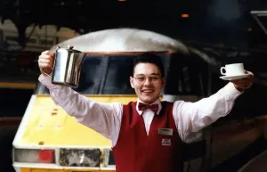 Waiter Prints: Martin Wilson of Wallsend serves free tea and coffee to first class passengers