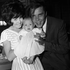 Kim Wilde Prints: Marty Wilde at London Airport with his wife Joyce and their six month old daughter Kim