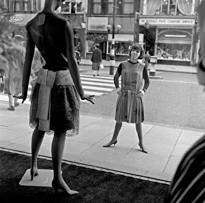 Mary Quant, clothes designer, standing outside her shop Bazaar