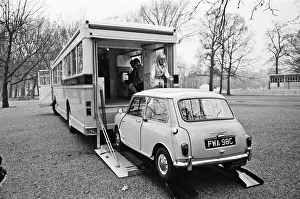 Invention Prints: A massive road cruiser with parking inside for a Mini was driven through London