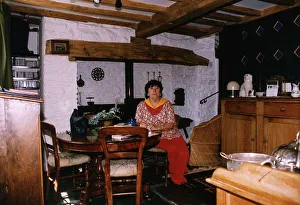 Mavis Nicholson TV Presenter sitting in her Dining Room Area