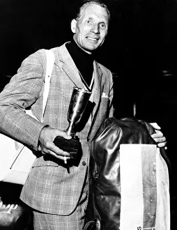 00130 Prints: Max Faulkner British golfer arrives back at Gatwick Airport after winning Portuguese Open