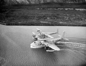 The Mayo composite aircraft seen here during taxi-ing trials along the River Medway 19th