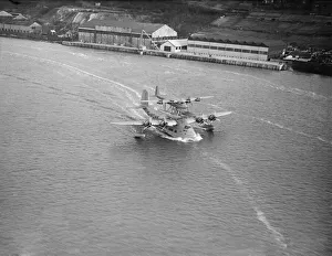 The Mayo composite aircraft seen here during taxi-ing trials along the River Medway 19th