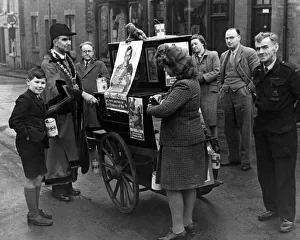 Collection Prints: Mayor helps Red Cross by barrel organ performances: Councillor S. S. Wilson, J. P