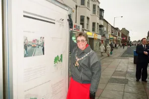 Mayor of Langbaurgh Brenda Forster unveils a poster in their fight against anti