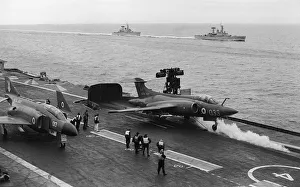 McDonnell Douglas Phantom FG1 (F-4K) of 892 Naval Air Sqd waits as a Blackburn Buccaneer