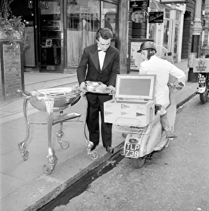 00064 Prints: Meals on Wheels: The head waiter of the Romains Buttery loads up the restaurants