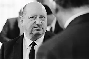 Media Mogul Lord Lew Grade speaking to a guest at a dinner party. 24th January 1967