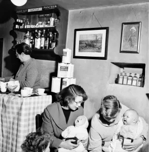 00064 Prints: Medical: Baby: Clinic: Once every week the Falklands Arm pub near Stratford stops serving
