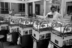 Medical: Childbirth. The newly born Letts quintuplets in their incubators at University