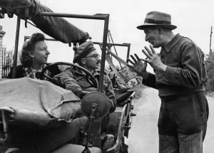 Medical officer Captain Rs Devor of South Africa goes on his rounds in his Jeep