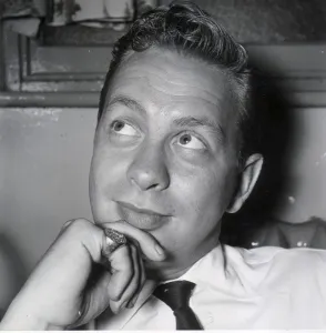 01529 Prints: MEL TORME, AMERICAN SINGER IN HIS DRESSING ROOM DURING UK VISIT - JULY 1956