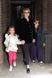 Melanie Griffith Actress leaving her flat in mayfair with children Dakota and Alexander