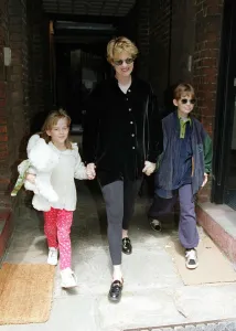 Melanie Griffith Actress leaving her flat in mayfair with children Dakota and Alexander