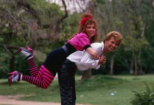 Melanie Hill actress May 1989 Climbing on Vince Brickley back
