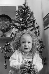 Xmas Prints: Meltham Fire Station Christmas party - young girl with tinsel wrapped round her head