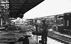 Bombings Prints: A member of the 151st Railway Construction Company of the Royal Engineers seen here