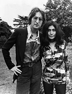 Former member of The Beatles pop group John Lennon pictured with his wife Yoko Ono
