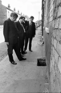 Member of Parliament for Birmingham Sparkbrook Roy Hattersley visits slum housing in