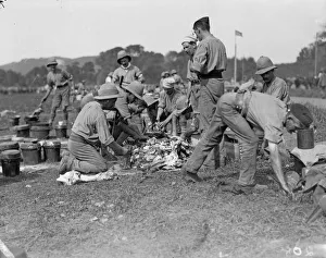 Minorities Prints: Members of the 1st Manchester Regiment seen here in their field kitchen at the the race